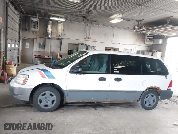 2006 Ford Freestar Cargo with VIN 2FTZA54666BA14556, listed as a IAAI auction lot 42103437 with 147,998 mi miles. Bid and sale history available at carsss.com. Image 14.