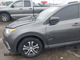 2016 Toyota RAV4 LE with VIN JTMZFREV5GJ093472, listed as a IAAI auction lot 41332037 with 212,869 mi miles. Bid and sale history available at carsss.com. Image 6.