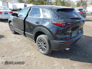 2022 Mazda CX-30 S with VIN 3MVDMBALXNM402265, listed as a IAAI auction lot 41458605 with 76,291 mi miles and . Bid and sale history available at carsss.com. Image 3.
