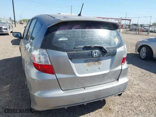 2009 Honda Fit Sport w/Navi with VIN JHMGE88619S020572, listed as a IAAI auction lot 41755126 with 202,358 mi miles. Bid and sale history available at carsss.com. Image 3.