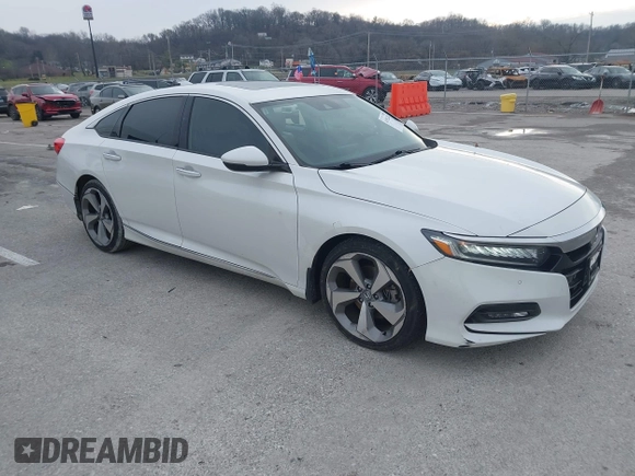2020 Honda Accord Touring with VIN 1HGCV2F96LA011360, listed as a IAAI auction lot 41192112 with 64,643 mi miles and . Bid and sale history available at DreamBid. Image 1.