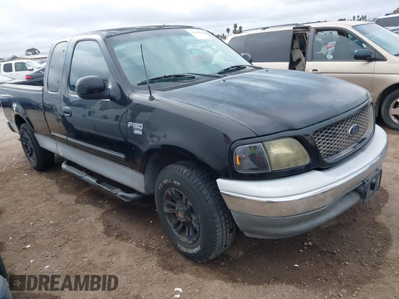 2002 Ford F-150 XL with VIN 1FTRX17W92NC06992, listed as a IAAI auction lot 41194470 with 253,923 mi miles. Bid and sale history available at carsss.com. Image 1.