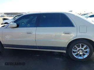 2010 Cadillac DTS w/1SC with VIN 1G6KD5EY6AU134372, listed as a IAAI auction lot 41786835 with 95,354 mi miles. Bid and sale history available at carsss.com. Image 14.