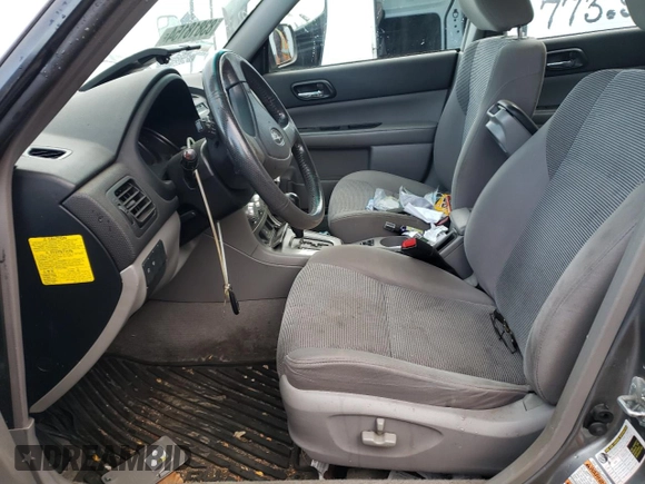 2007 Subaru Forester X with VIN JF1SG65677H717534, listed as a Copart auction lot 83818154 with 132,921 mi miles and Salvage title. Bid and sale history available at DreamBid. Image 7.