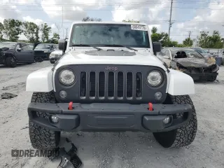 2017 Jeep Wrangler Unlimited Rubicon z VIN 1C4HJWFG6HL692928, wystawiony jako Copart lot #60049775 z przebiegiem 145 033 mil mil oraz Nie do naprawy • Non repairable. Historia ofert i sprzedaży dostępna na DreamBid. Obrazek 5.