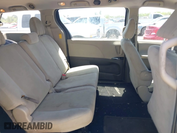 2014 Toyota Sienna L with VIN 5TDZK3DC1ES410012, listed as a IAAI auction lot 42005001 with 440,789 mi miles. Bid and sale history available at carsss.com. Image 8.