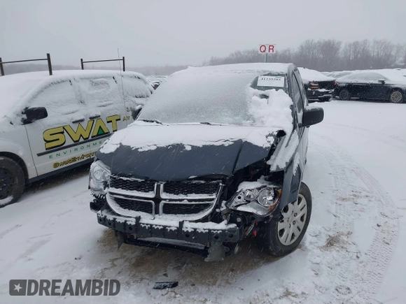 2013 Dodge Grand Caravan SE with VIN 2C4RDGBGXDR746630, listed as a IAAI auction lot 41239381 with 213,421 mi miles and . Bid and sale history available at DreamBid. Image 6.