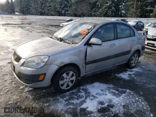 2008 Kia Rio LX with VIN KNADE123186392136, listed as a Copart auction lot 43274905 with 124,690 mi miles and Clean Title. Bid and sale history available at carsss.com. Image 1.