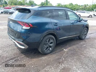 2023 Kia Sportage SX-Prestige with VIN KNDPXCAGXP7011855, listed as a IAAI auction lot 42346789 with 39,088 mi miles and . Bid and sale history available at DreamBid. Image 4.