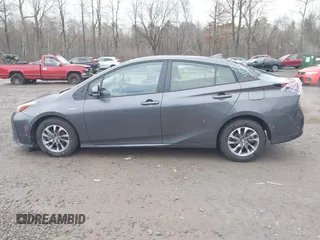 2019 Toyota Prius L Eco z VIN JTDKARFU7K3077941, wystawiony jako IAAI lot #41865759 z przebiegiem 254 612 mil mil oraz . Historia ofert i sprzedaży dostępna na DreamBid. Obrazek 14.