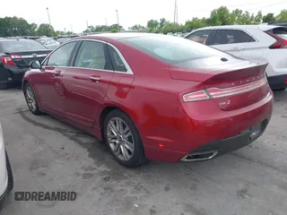 2015 Lincoln MKZ z VIN 3LN6L2GK3FR622116, wystawiony jako IAAI lot #42308692 z przebiegiem 126 047 mil mil oraz . Historia ofert i sprzedaży dostępna na DreamBid. Obrazek 3.