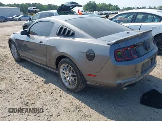 2014 Ford Mustang V6 with VIN 1ZVBP8AM3E5225590, listed as a IAAI auction lot 42148999 with 94,911 mi miles and . Bid and sale history available at DreamBid. Image 3.