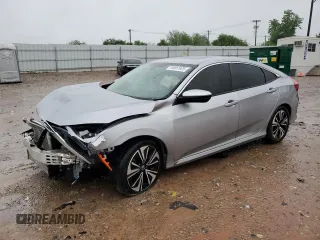 2018 Honda Civic EX-L z VIN JHMFC1F72JX024562, wystawiony jako Copart lot #54807065 z przebiegiem 131 946 mil mil oraz Szkoda całkowita • Salvage title. Historia ofert i sprzedaży dostępna na DreamBid. Obrazek 1.
