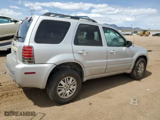 2007 Mercury Mariner Luxury with VIN 4M2YU91117KJ02032, listed as a Copart auction lot 50418815 with 128,498 mi miles and Salvage Title. Bid and sale history available at carsss.com. Image 3.