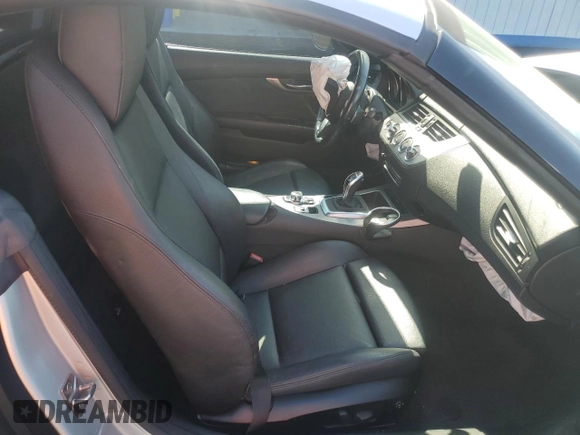 2011 BMW Z4 sDrive35is with VIN WBALM1C54BE633439, listed as a Copart auction lot 60327265 with 112,302 mi miles and Salvage title. Bid and sale history available at DreamBid. Image 10.