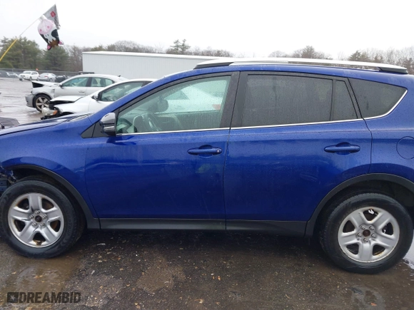 2015 Toyota RAV4 XLE with VIN 2T3RFREV8FW302638, listed as a IAAI auction lot 41857685 with 233,189 mi miles. Bid and sale history available at carsss.com. Image 14.