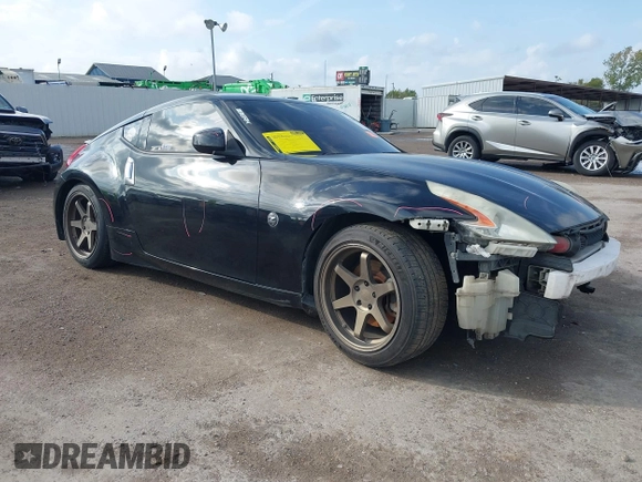 2015 Nissan 370Z Sport with VIN JN1AZ4EH8FM443095, listed as a IAAI auction lot 41105775 with 135,354 mi miles. Bid and sale history available at carsss.com. Image 1.