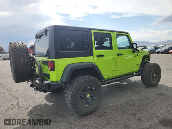 2012 Jeep Wrangler Unlimited Call of Duty MW3 z VIN 1C4BJWFG4CL242211, wystawiony jako Copart lot #59774555 z przebiegiem 117 463 mil mil oraz Szkoda całkowita • Salvage title. Historia ofert i sprzedaży dostępna na DreamBid. Obrazek 3.