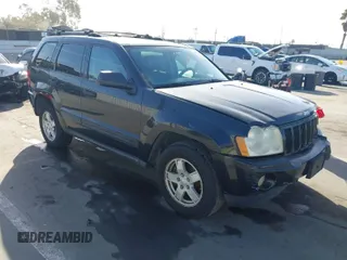 2005 Jeep Grand Cherokee Laredo with VIN 1J8GS48K95C615330, listed as a IAAI auction lot 41719101 with 152,186 mi miles and . Bid and sale history available at DreamBid. Image 1.