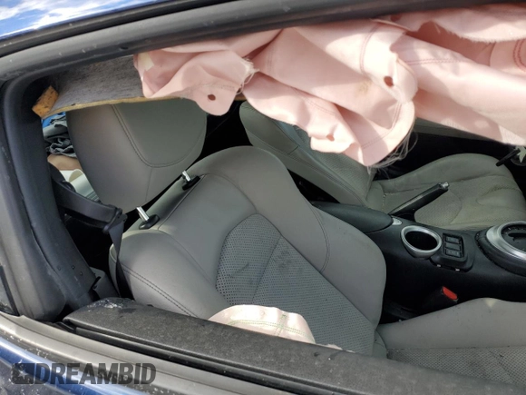2013 Nissan 370Z z VIN JN1AZ4EH4DM383023, wystawiony jako Copart lot #88204985 z przebiegiem 138 112 mil mil oraz Szkoda całkowita • Salvage title. Historia ofert i sprzedaży dostępna na DreamBid. Obrazek 11.