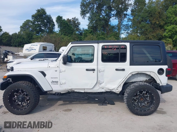 2018 Jeep Wrangler Unlimited Sahara z VIN 1C4HJXEG4JW220092, wystawiony jako IAAI lot #40522478 z przebiegiem 90 529 mil mil oraz . Historia ofert i sprzedaży dostępna na DreamBid. Obrazek 14.