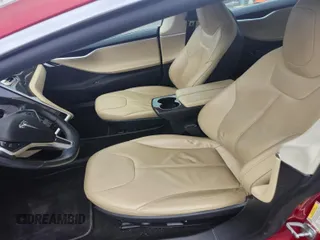 2013 Tesla Model S с VIN 5YJSA1DN6DFP26504, выставлен на аукционе IAAI как лот 41703859 с пробегом 135 552 миль миль и . История ставок и продаж доступна на DreamBid. Изображение 5.
