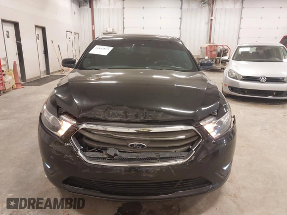 2015 Ford Taurus SEL with VIN 1FAHP2H80FG133240, listed as a IAAI auction lot 41897873 with 189,059 mi miles. Bid and sale history available at carsss.com. Image 12.