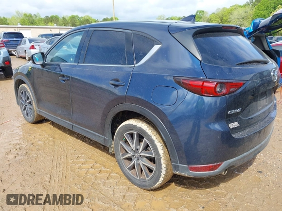 2018 Mazda CX-5 Grand Touring z VIN JM3KFADM8J1406007, wystawiony jako IAAI lot #42008567 z przebiegiem 110 661 mil mil oraz . Historia ofert i sprzedaży dostępna na DreamBid. Obrazek 3.