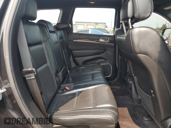 2015 Jeep Grand Cherokee High Altitude с VIN 1C4RJFCG2FC213054, выставлен на аукционе Copart как лот 59145225 с пробегом 132 880 миль миль и Списание • Salvage title. История ставок и продаж доступна на DreamBid. Изображение 11.