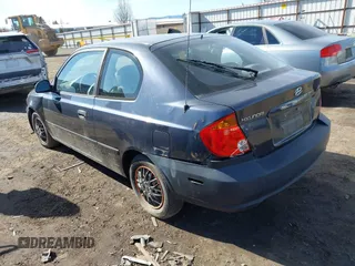 2005 Hyundai Accent GLS with VIN KMHCG35C95U365902, listed as a IAAI auction lot 41715161 with 149,766 mi miles. Bid and sale history available at carsss.com. Image 3.