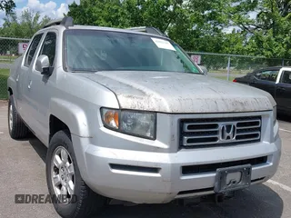 2007 Honda Ridgeline RTL with VIN 2HJYK16587H542969, listed as a IAAI auction lot 42823187 with 171,757 mi miles and . Bid and sale history available at DreamBid. Image 1.