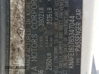 2006 Kia Spectra z VIN KNAFE161765347044, wystawiony jako Copart lot #58914114 z przebiegiem Nie podano mil oraz Szkoda całkowita • Salvage title. Historia ofert i sprzedaży dostępna na DreamBid. Obrazek 12.
