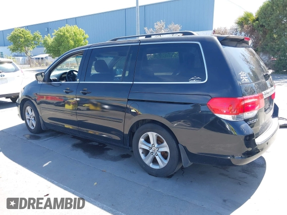 2008 Honda Odyssey Touring with VIN 5FNRL38948B116432, listed as a IAAI auction lot 42162566 with 121,996 mi miles. Bid and sale history available at carsss.com. Image 3.