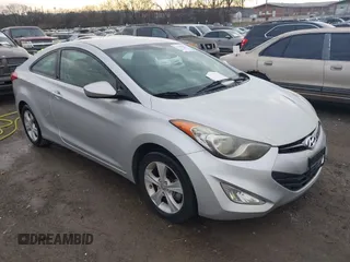 2013 Hyundai Elantra Coupe SE with VIN KMHDH6AE8DU011104, listed as a IAAI auction lot 41588963 with 112,726 mi miles. Bid and sale history available at carsss.com. Image 1.