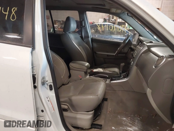 2006 Suzuki Grand Vitara Luxury with VIN JS3TD947764101438, listed as a IAAI auction lot 41610148 with 172,483 mi miles and . Bid and sale history available at DreamBid. Image 5.