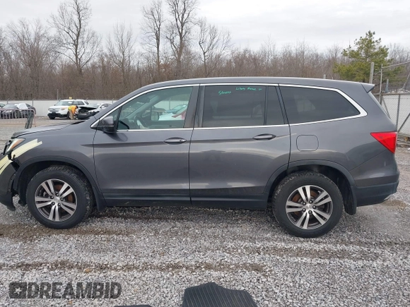 2017 Honda Pilot EX-L with VIN 5FNYF6H59HB029160, listed as a IAAI auction lot 41557192 with 157,153 mi miles and . Bid and sale history available at DreamBid. Image 15.