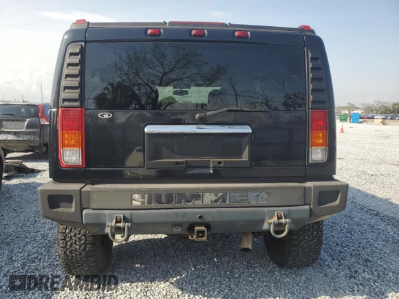 2003 Hummer H2 z VIN 5GRGN23U33H121992, wystawiony jako Copart lot #50388175 z przebiegiem 237 169 mil mil oraz Czysty tytuł • Clean title. Historia ofert i sprzedaży dostępna na DreamBid. Obrazek 6.