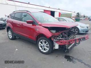 2018 Ford Escape SE z VIN 1FMCU9GD8JUB14803, wystawiony jako IAAI lot #41842056 z przebiegiem 50 712 mil mil oraz . Historia ofert i sprzedaży dostępna na DreamBid. Obrazek 1.