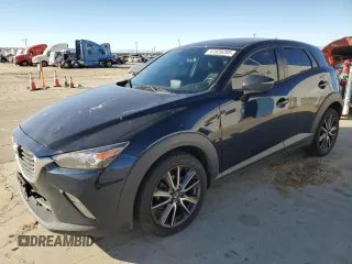 2017 Mazda CX-3 Touring z VIN JM1DKDC74H0165654, wystawiony jako Copart lot #41928295 z przebiegiem 173 567 mil mil oraz Szkoda całkowita • Salvage title. Historia ofert i sprzedaży dostępna na DreamBid. Obrazek 1.