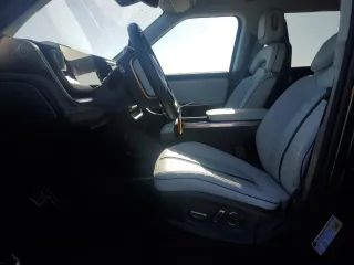 2023 Rivian R1S Launch Edition with VIN 7PDSGABL9PN020237, listed as a Copart auction lot 49249935 with 11,452 mi miles and Salvage Title. Bid and sale history available at carsss.com. Image 7.