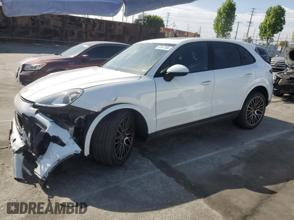 2021 Porsche Cayenne with VIN WP1AA2AYXMDA00148, listed as a Copart auction lot 52647565 with 27,977 mi miles and Salvage title. Bid and sale history available at DreamBid. Image 1.