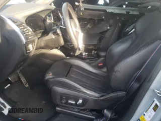 2022 BMW X4 M z VIN 5YM23EC05N9L05268, wystawiony jako Copart lot #81892214 z przebiegiem 37 163 mil mil oraz Szkody całkowita. Historia ofert i sprzedaży dostępna na DreamBid. Obrazek 7.