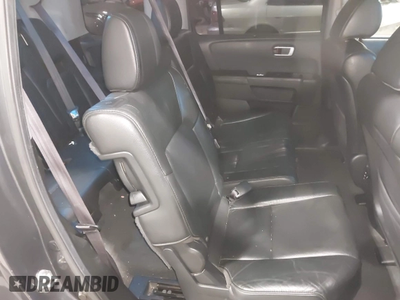 2012 Honda Pilot Touring with VIN 5FNYF4H99CB052034, listed as a IAAI auction lot 42023430 with 137,428 mi miles. Bid and sale history available at carsss.com. Image 8.