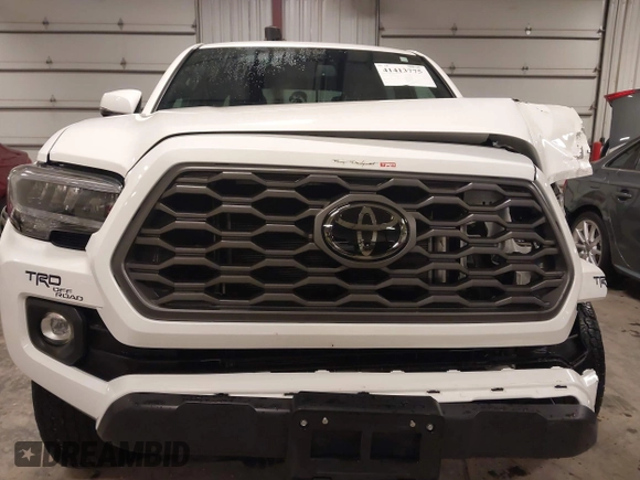 2021 Toyota Tacoma 4WD SR5 with VIN 3TMDZ5BN6MM113743, listed as a IAAI auction lot 41413775 with 24,735 mi miles. Bid and sale history available at carsss.com. Image 13.