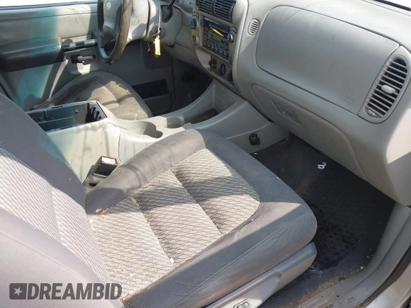 2003 Ford Explorer Sport Trac XLS z VIN 1FMZU77E73UB97392, wystawiony jako IAAI lot #42400398 z przebiegiem 160 556 mil mil oraz . Historia ofert i sprzedaży dostępna na DreamBid. Obrazek 5.