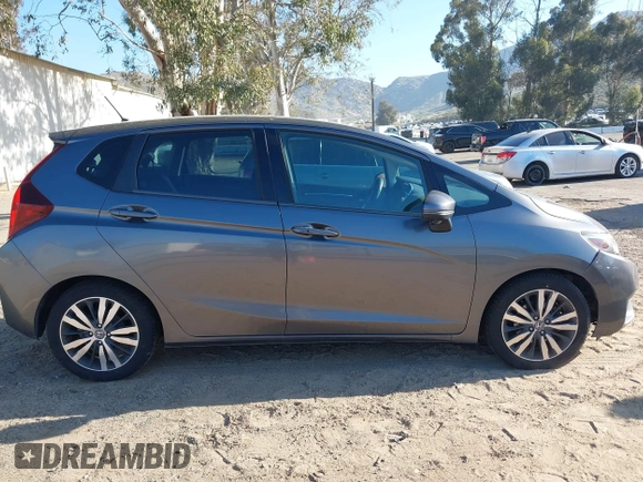 2015 Honda Fit EX-L with VIN 3HGGK5H88FM772964, listed as a IAAI auction lot 42020142 with 154,799 mi miles. Bid and sale history available at carsss.com. Image 13.