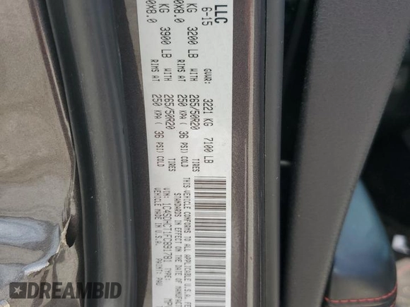 2015 Dodge Durango R/T with VIN 1C4SDHCT1FC891781, listed as a Copart auction lot 62664555 with 107,573 mi miles and Salvage title. Bid and sale history available at DreamBid. Image 13.