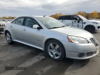 2009 Pontiac G6 with VIN 1G2ZL577094232011, listed as a Copart auction lot 77175054 with 133,353 mi miles and Salvage title. Bid and sale history available at DreamBid. Image 4.