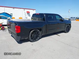 2017 Chevrolet Silverado 1500 LT with VIN 3GCUKREC5HG407502, listed as a IAAI auction lot 42013284 with 79,638 mi miles and . Bid and sale history available at DreamBid. Image 4.