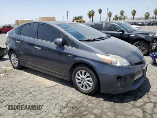 2014 Toyota Prius with VIN JTDKN3DP1E3056795, listed as a Copart auction lot 61605975 with 211,392 mi miles and Salvage title. Bid and sale history available at DreamBid. Image 4.